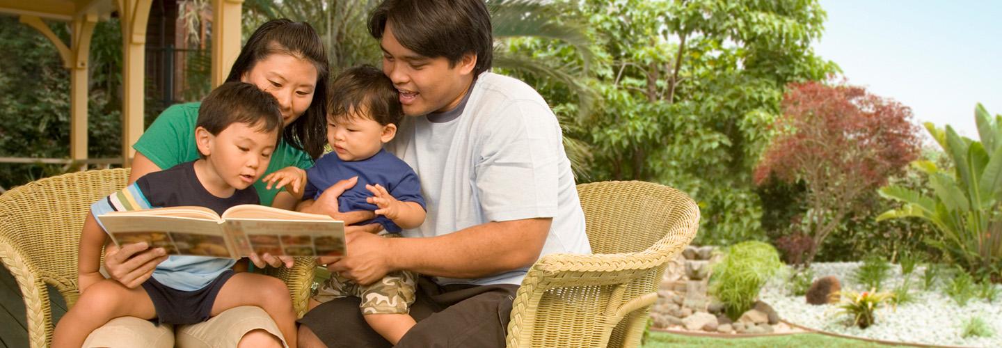 young parents read to their children