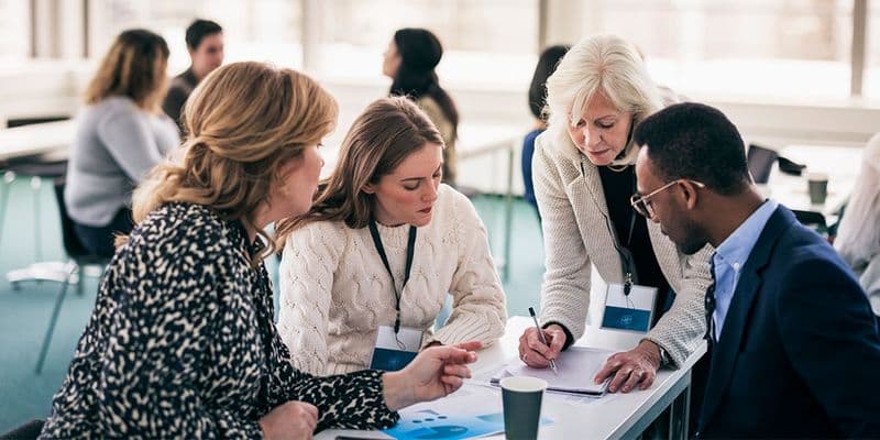 a group works together om a plan